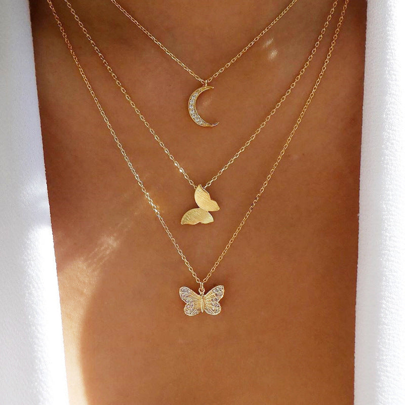 Triple Layered Moon Double Butterfly Pendant